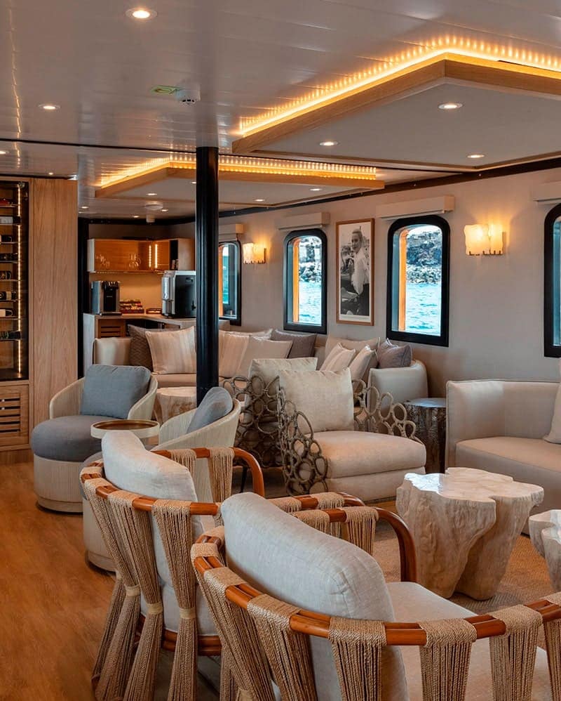 Classy saloon on Grace Yacht, an exclusive vessel for 16 guests, filled with history and elegance